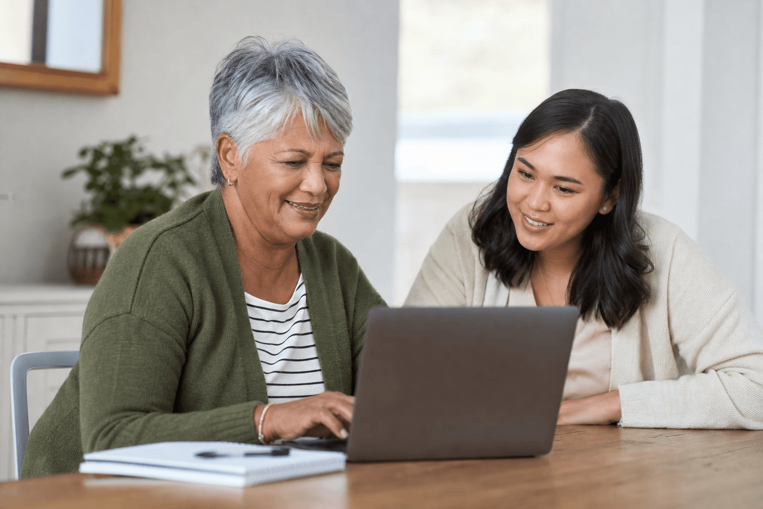 An adult building tech confidence with a coach